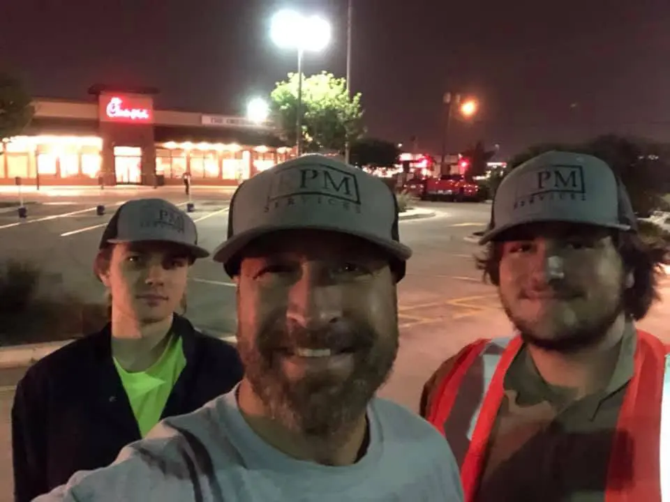 RPM night crew in company hats at a restaurant job